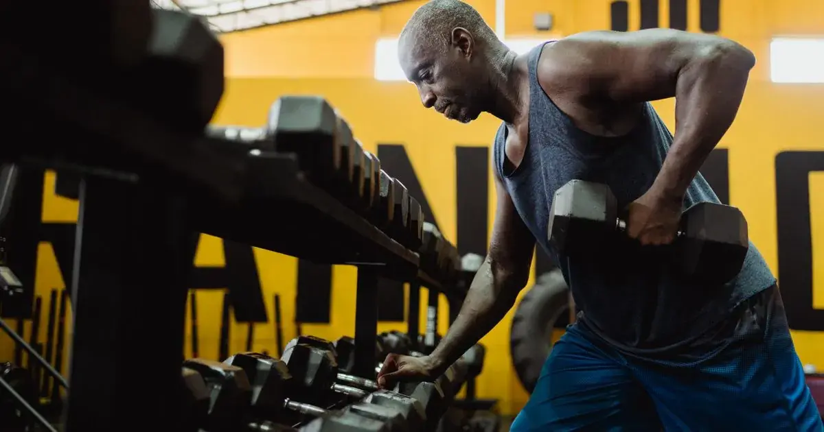 How to Do a Dumbbell Row: Muscles Worked, Form, and Progression