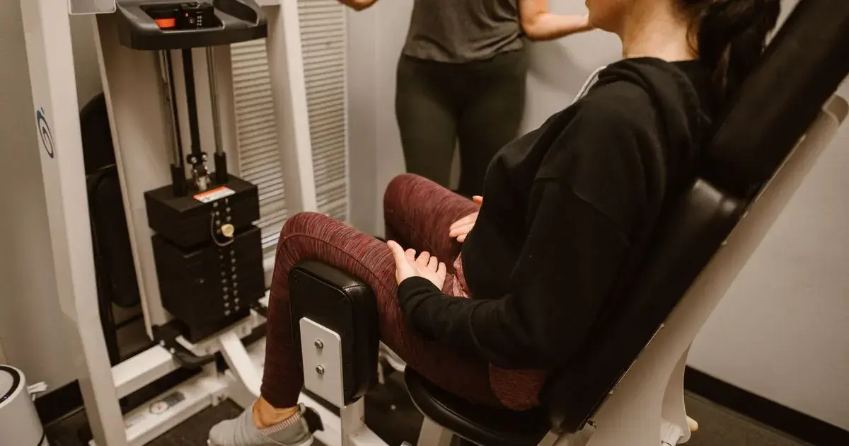 How to Use the Hip Abduction Machine: Muscles Worked, Form, and Lean
