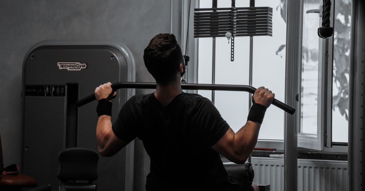 How to Lat Pulldown: Muscles Worked, Form, and Progression